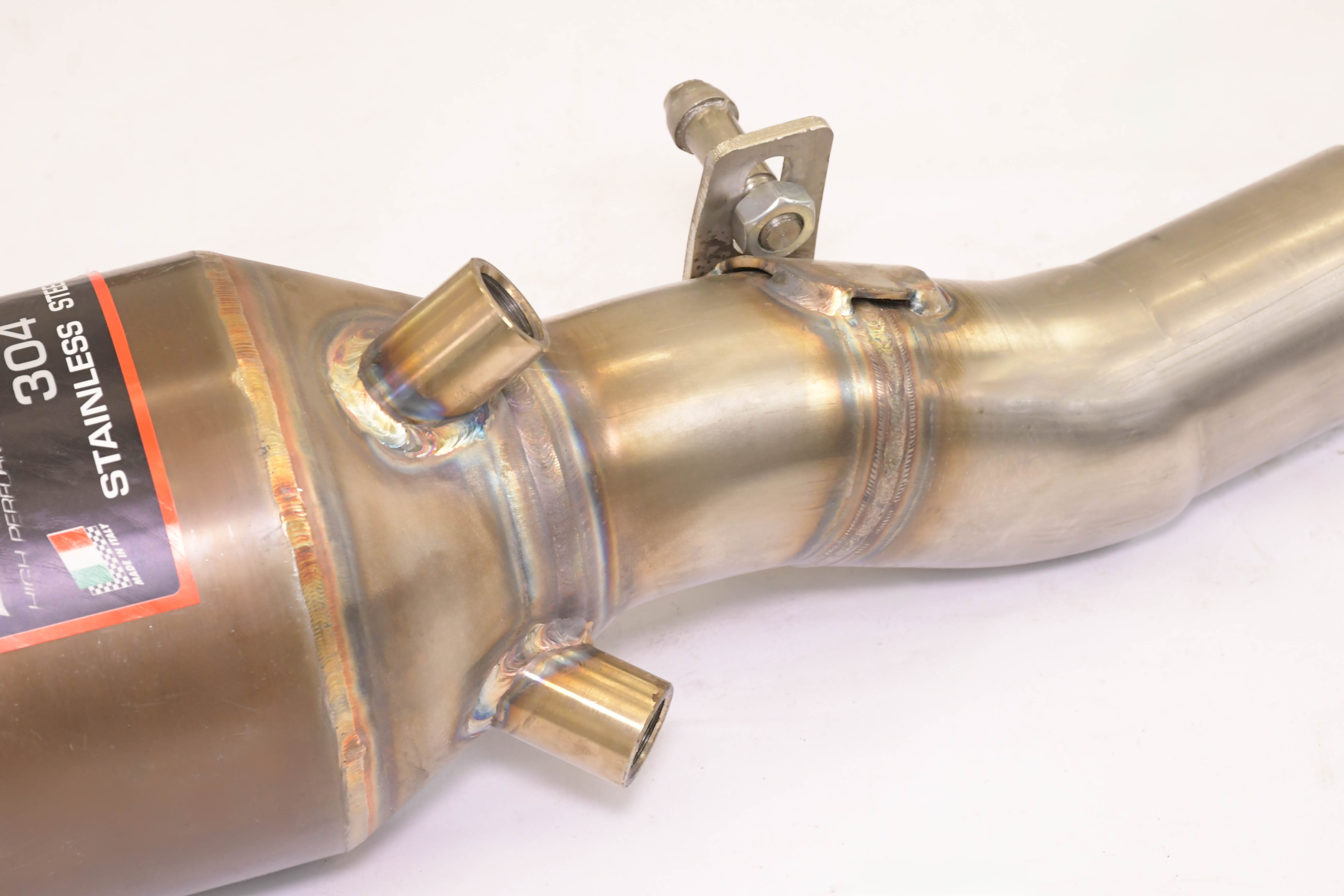 Front exhaust Right with Metallic catalytic converter.