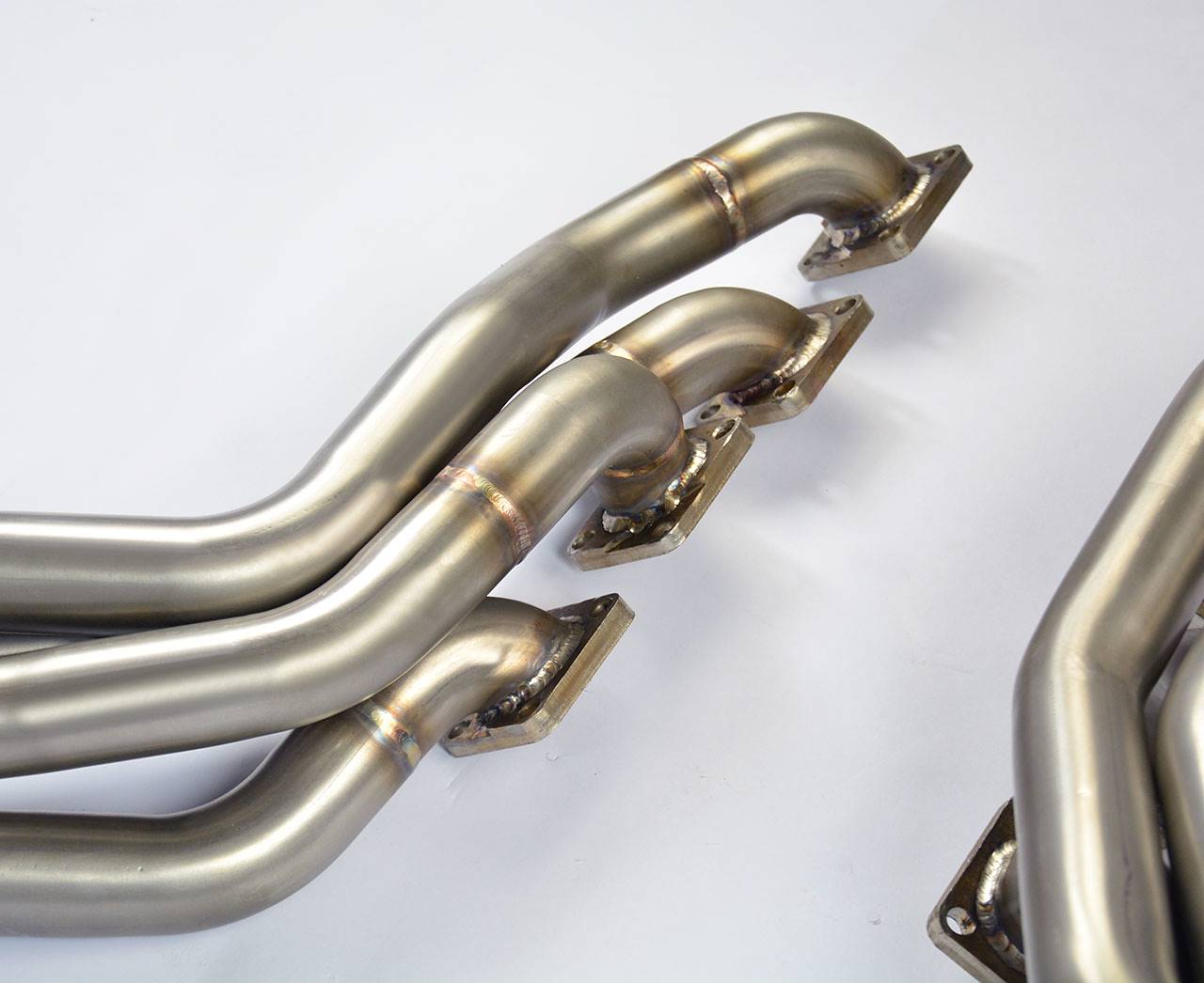 Fächerkrümmer Rechts + Links (Left Hand Drive) (Supersprint Design Patent)