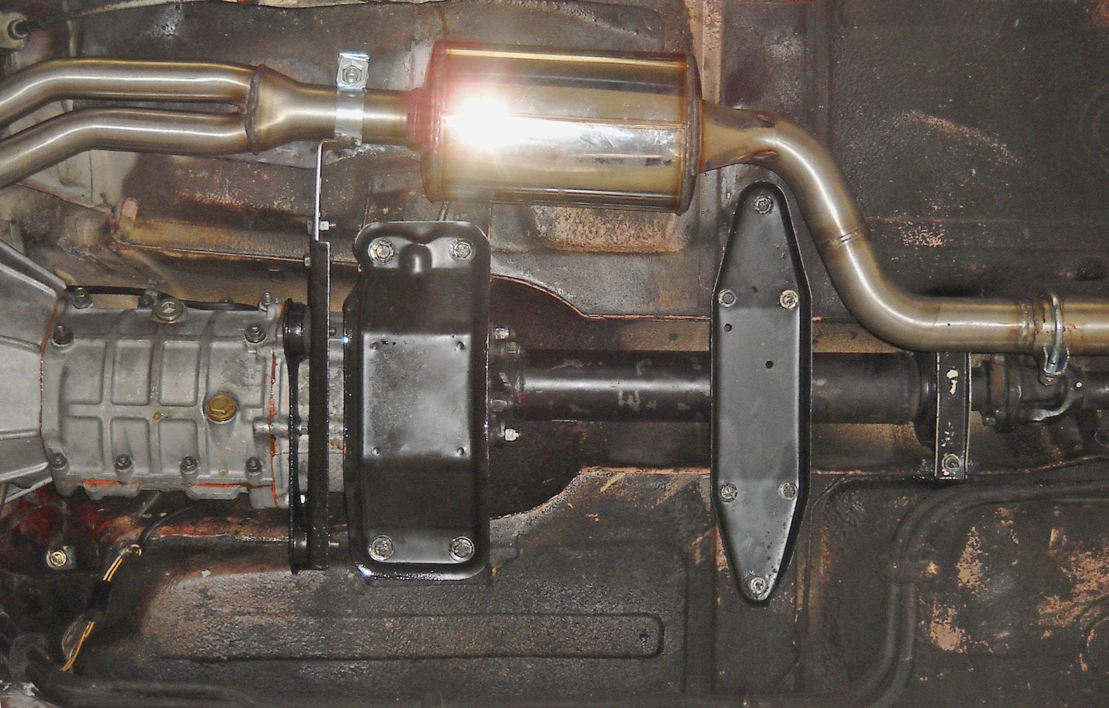 Front exhaust - resonated narrower bend layout